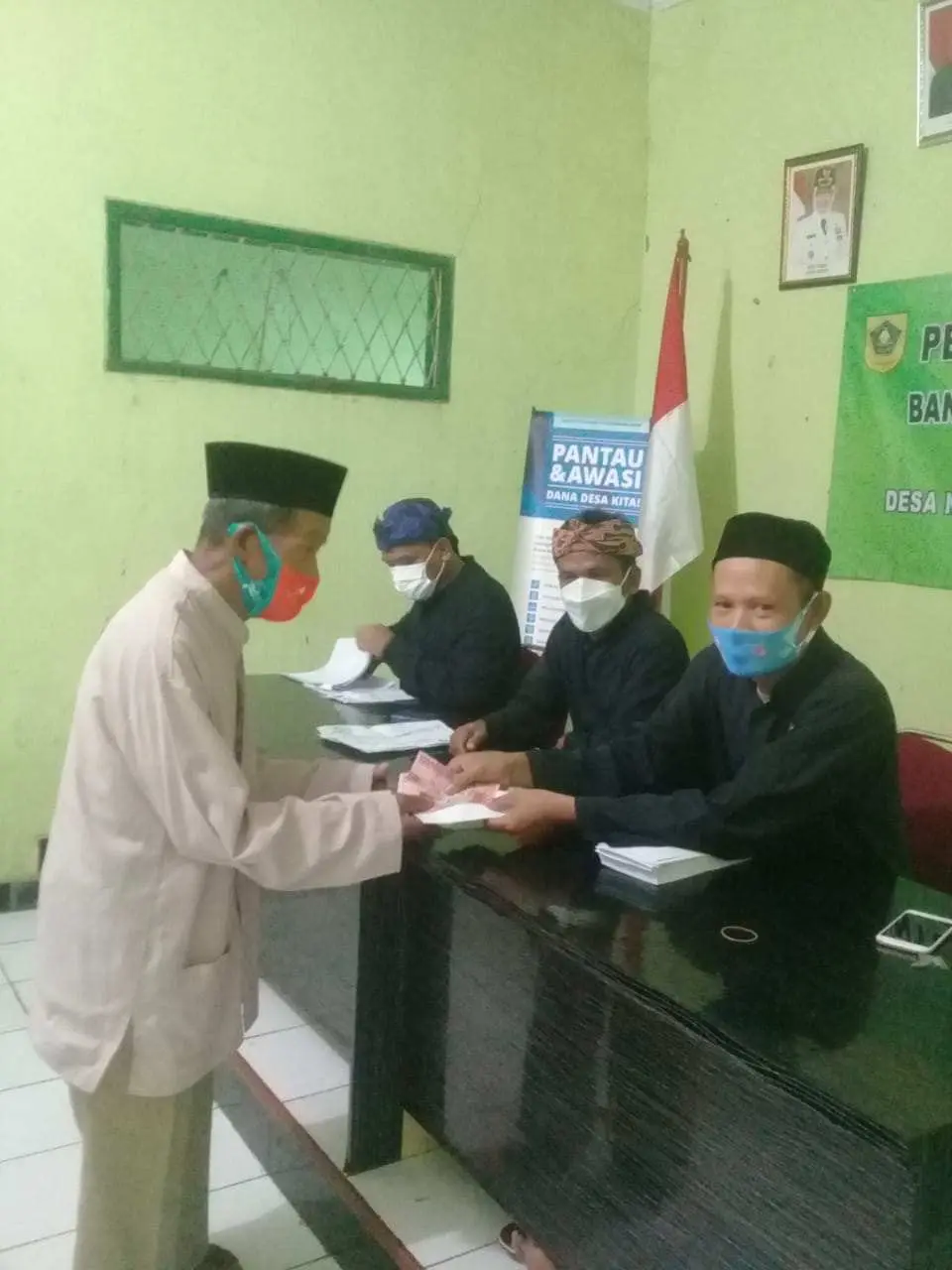 Pemdes Nanggerang Kembali Salurkan BLT DD Tahun 2021 kepada 148 KPM