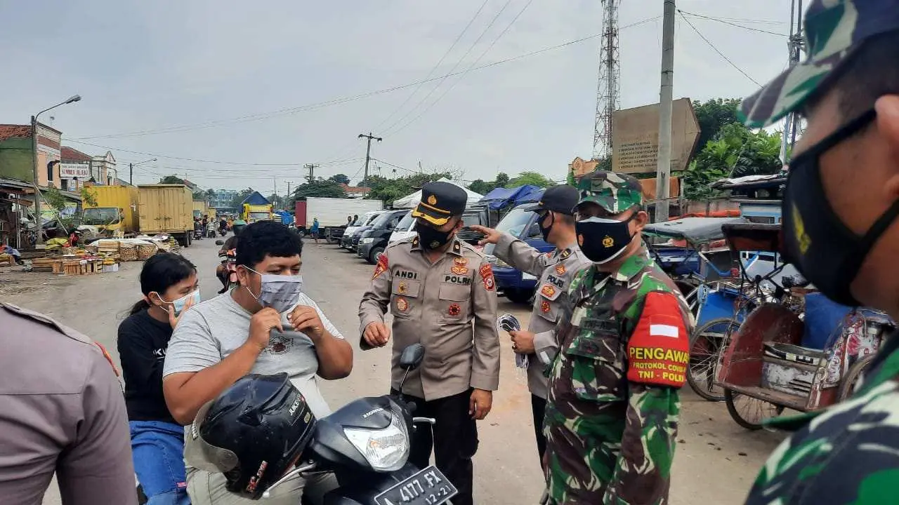 Sinergi 3 Pilar Satgas Covid-19 Provinsi Banten Bagikan 5000 Masker