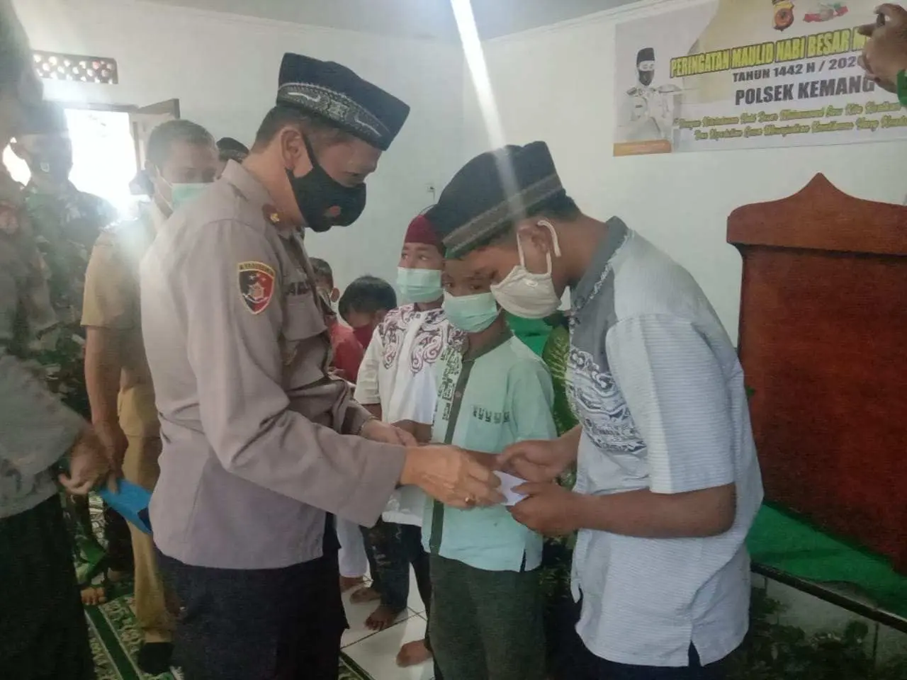 Kapolsek Kemang Ajak Warga Kuatkan Persaudaraan dan Kepedulian kepada Sesama