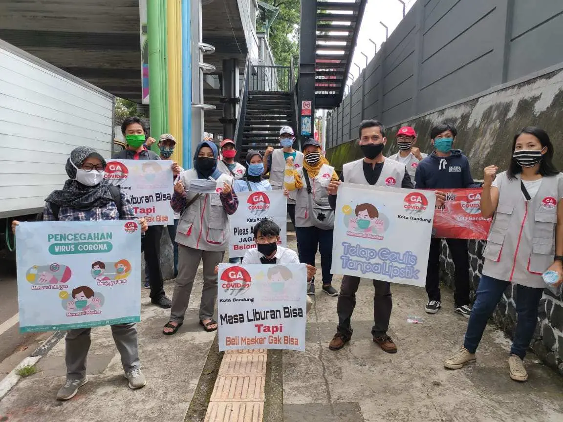 Gerakan Anti Covid-19 Kota Bandung Sosialisasikan 3M dan Bagi-bagi Masker