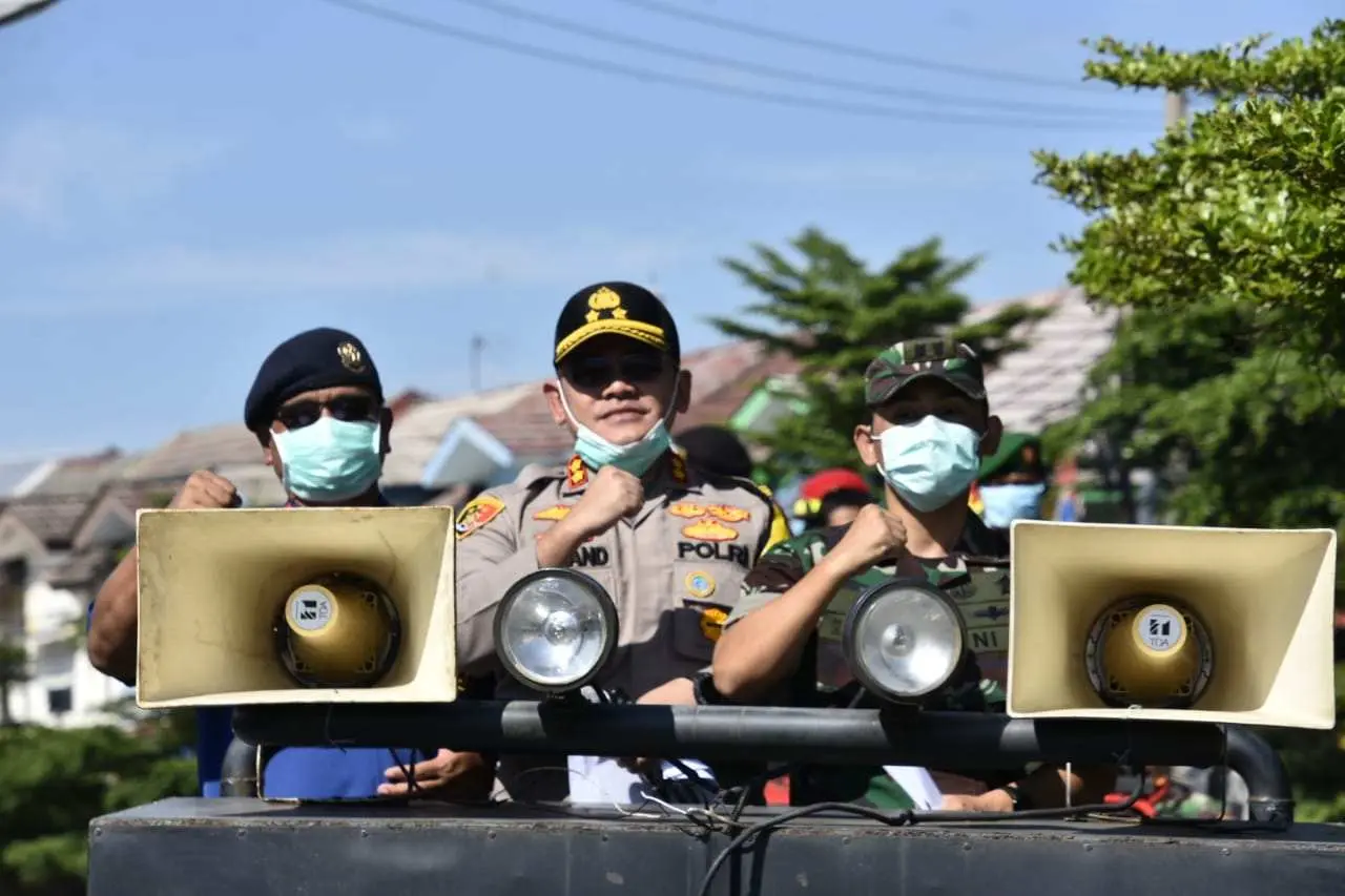 TNI-Polri, Damkar dan Linmas Kab. Bogor Serentak Lakukan Penyemprotan Disinfektan Covid19